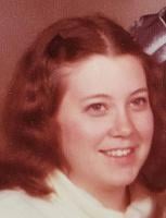 Janis M. Millu